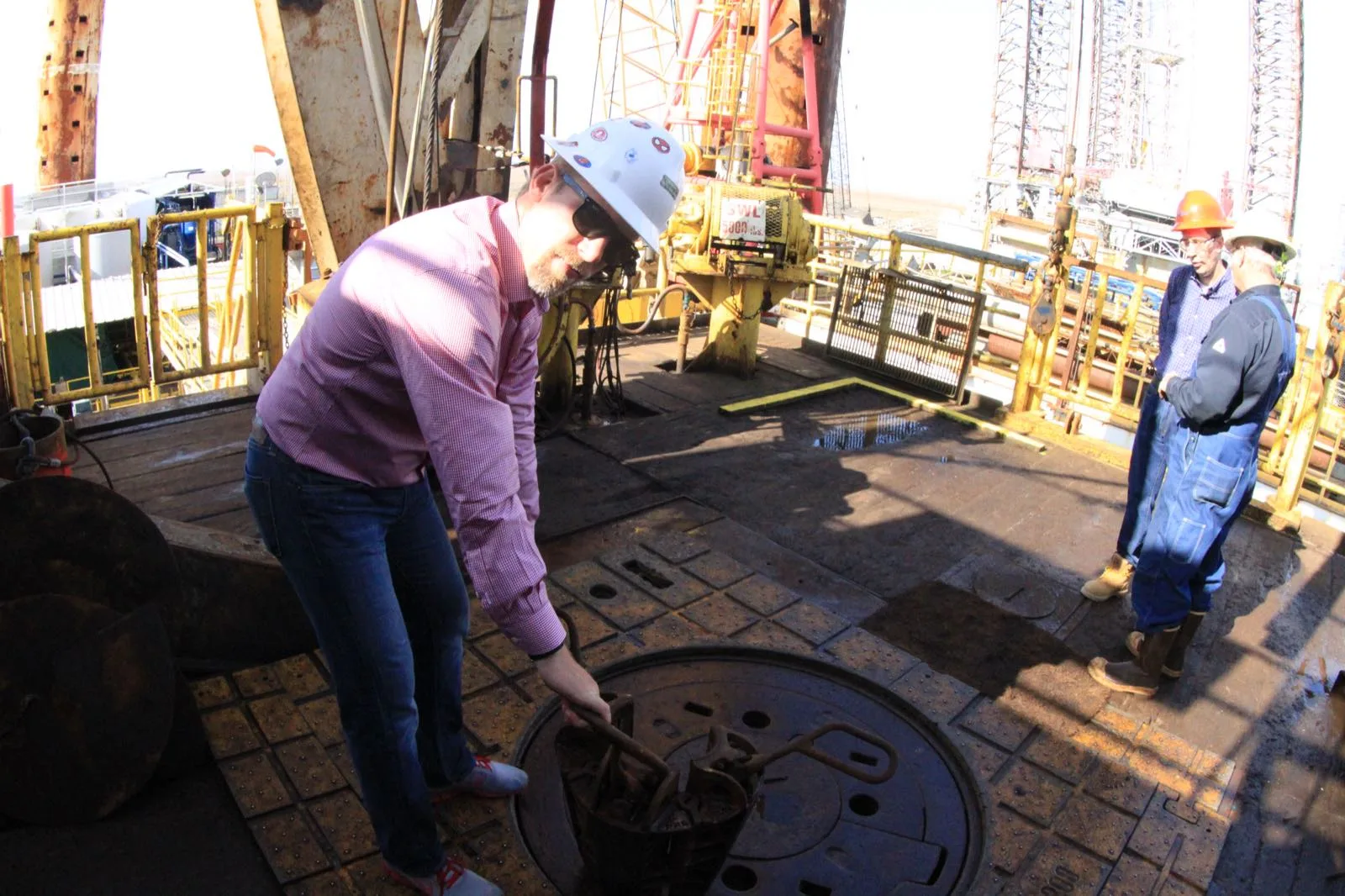 A VB Attorneys lawyer inspecting the rotary table on a drill floor