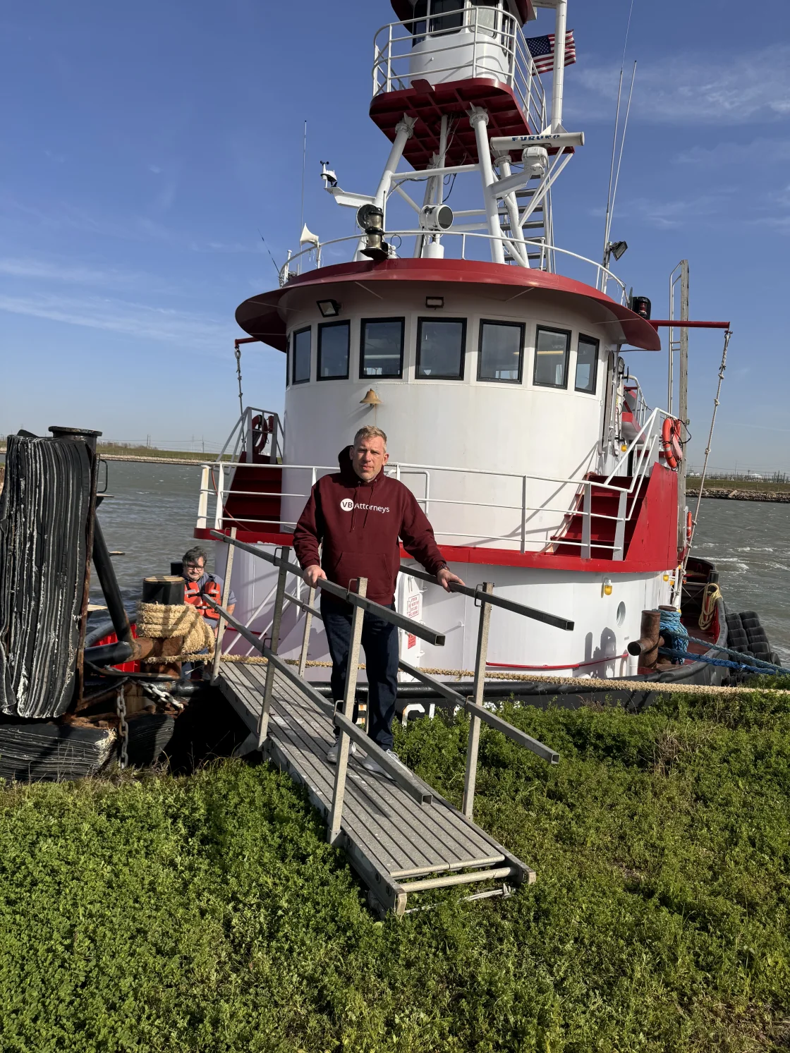 Brian Beckcom inspecting a tug at the dock