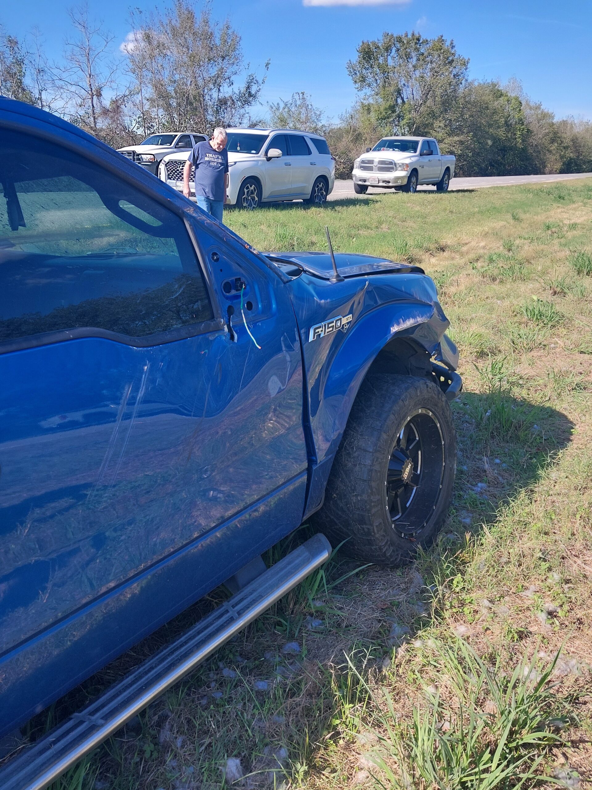 Damage to Efren’s pickup after the logging-truck collision.