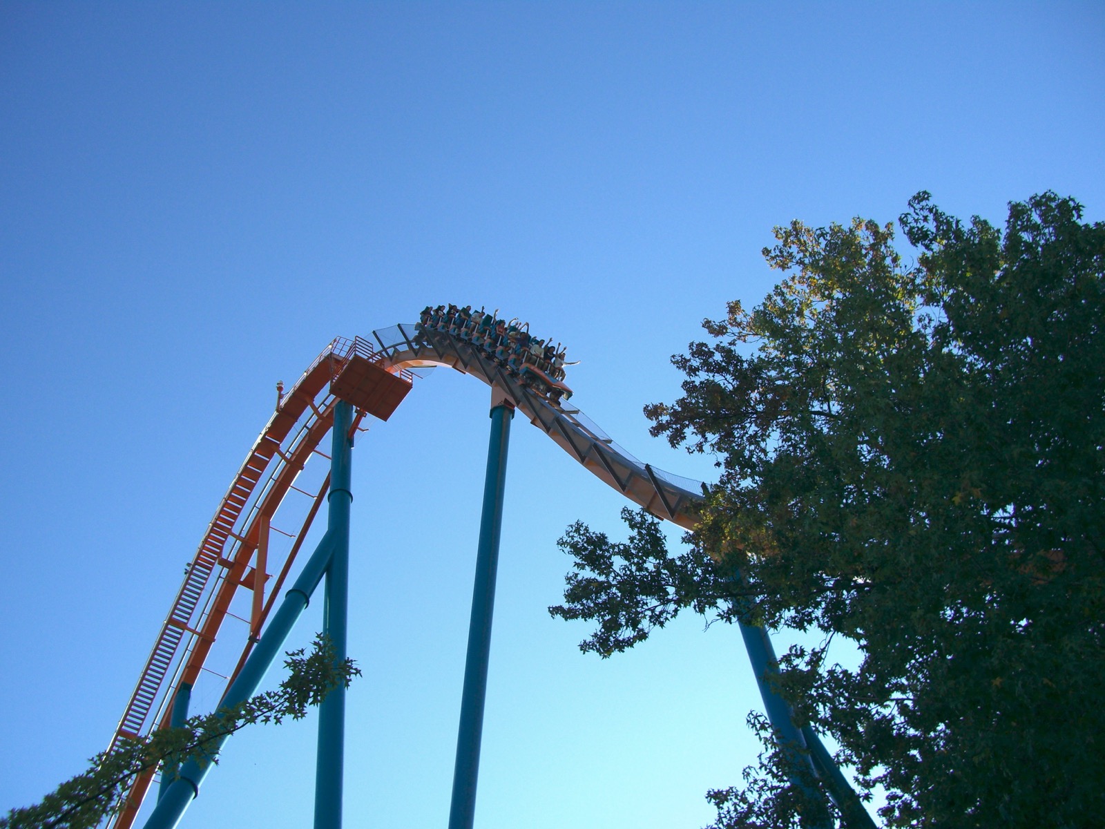 Goliath roller coaster train cresting orange track on teal supports at Six Flags Over Georgia, in a 2007 file photograph.