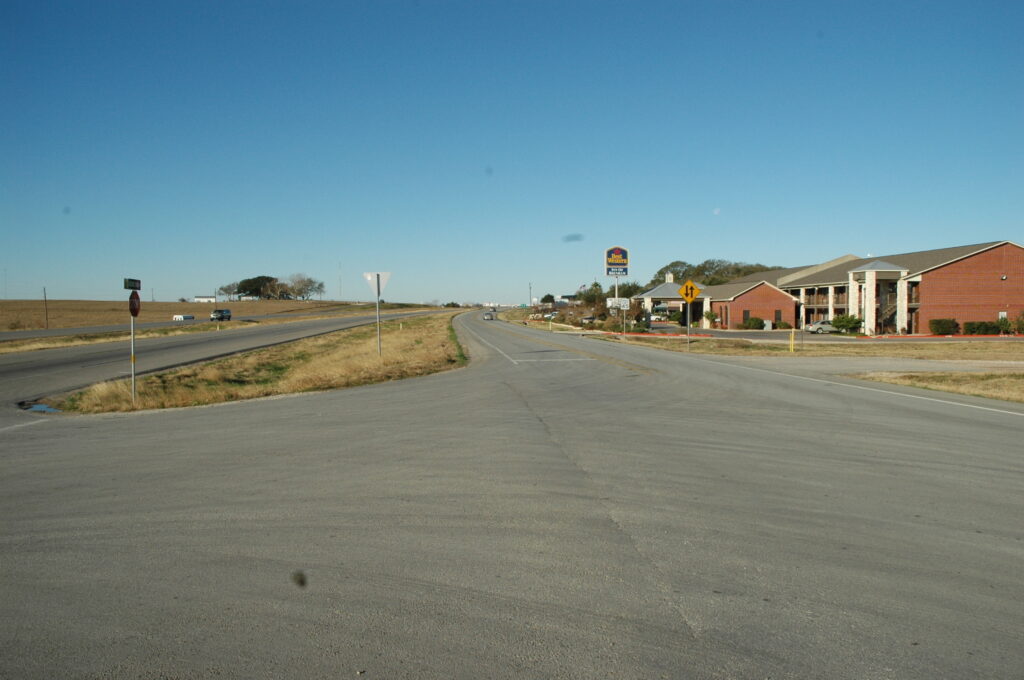 Intersection and roadway photographed during the investigation of James Wayne N.’s crash near Brenham.