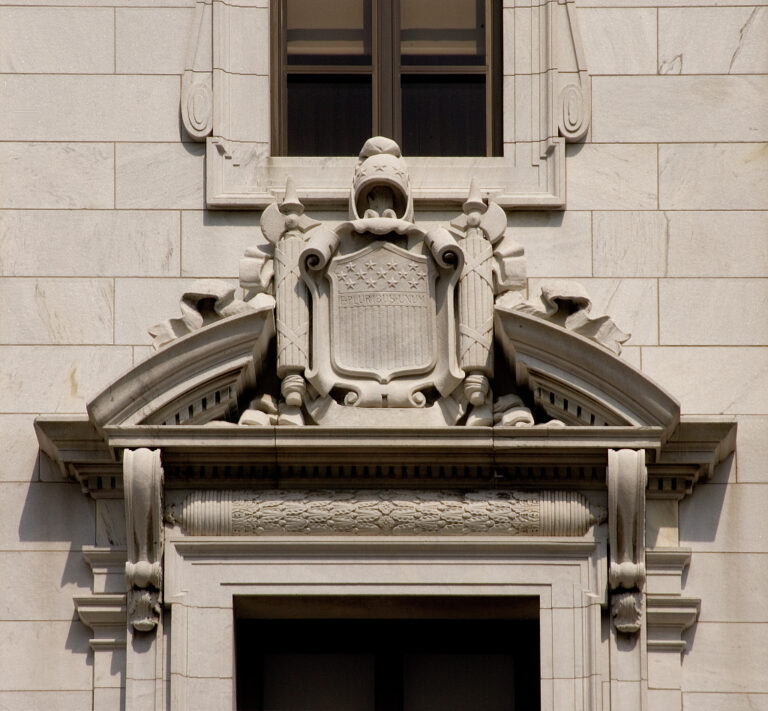 Stone architectural detail above an entrance to the John Minor Wisdom U.S. Court of Appeals Building in New Orleans.
