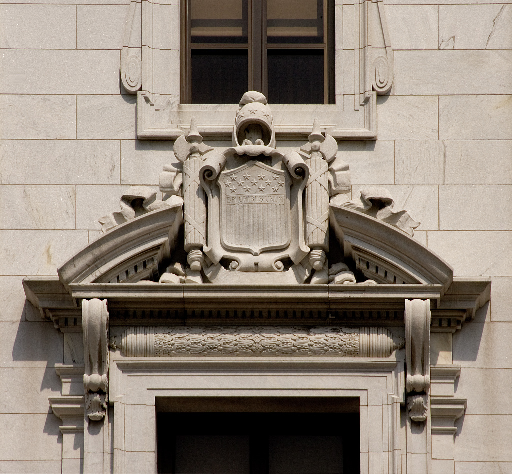 Stone architectural detail above an entrance to the John Minor Wisdom U.S. Court of Appeals Building in New Orleans.