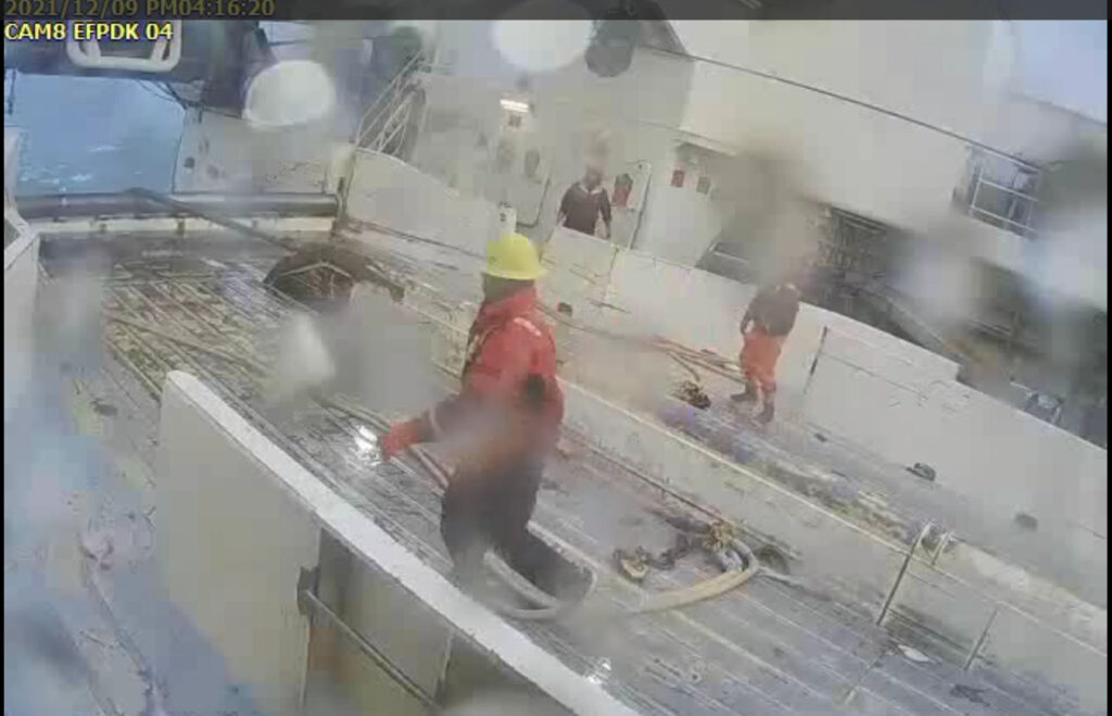 Still from the FT North Star incident video showing crew members working on deck.