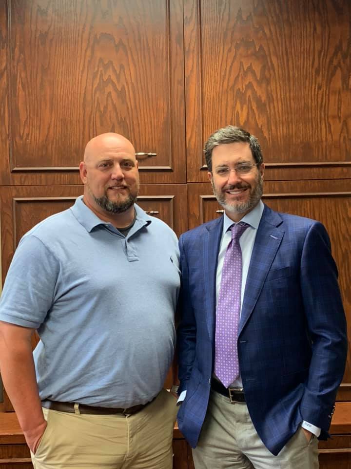 Robert M. with attorney Vuk Vujasinovic